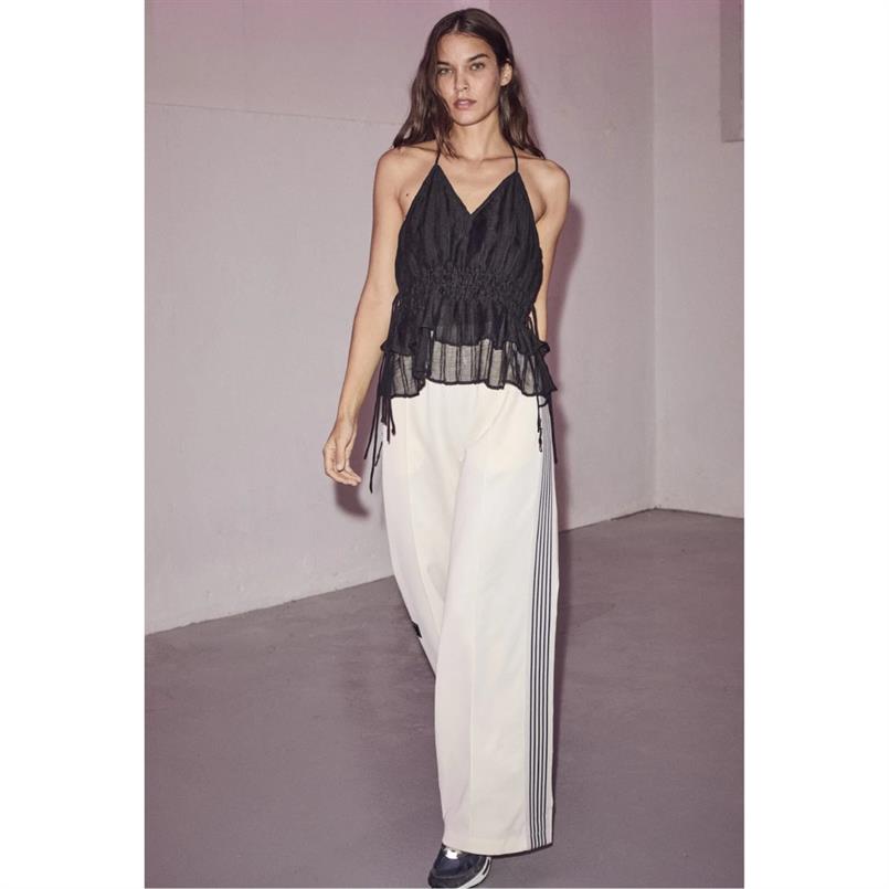 L&#39;Amitie Baggy track pants Transparant